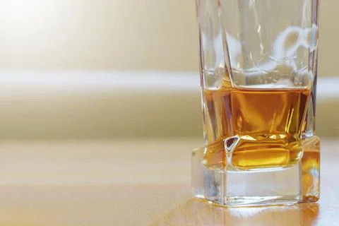 Glass of alcohol on the table, dependency concept Foto stock