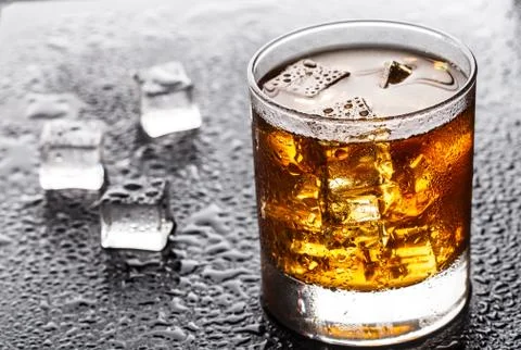 Glass with alcoholic drink Stock Photos