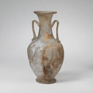 Glass amphora (two-handled bottle) 4th century A.D. Roman Colorless with pa.. Stock Photos