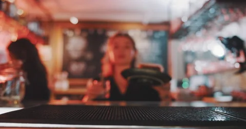 Glass and cake being placed on a counter Video stock 203581405
