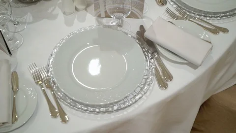 Glass and plate at the table Stock Footage 108905802