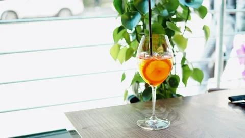 Glass with aperol and ice Stock Footage 157700174