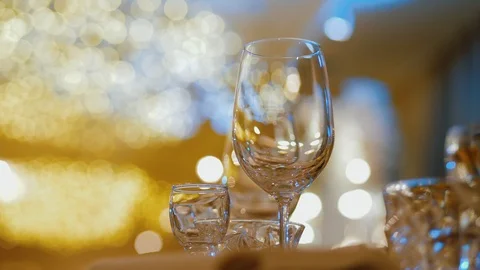 Glass are on elegant table ready for banquet dinner. Holiday or anniversary. Stock Footage 121369140