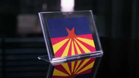 Glass Arizona Flag Rotating On Table 動画素材 208473035