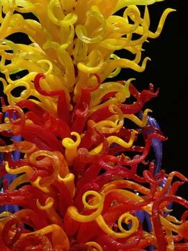 Glass artwork is exploding with vibrant colors and swirling shapes, creatin.. Stock Photos