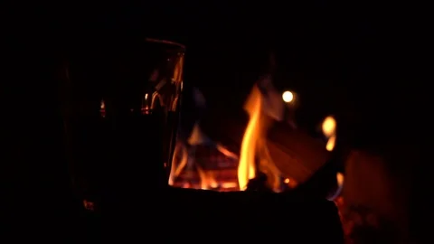 Glass on the background of fire Stock Footage 91184042