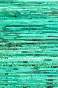 Glass background with stripe pattern in hue of green color. Stock Photos