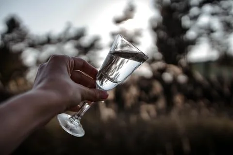 A glass on the background of the sunset Stock Photos