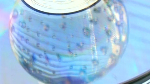 Glass ball on a light surface Stock Footage 672557