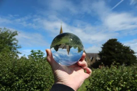 Glass ball upside down scene Stock Photos