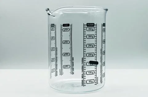 Glass Beaker 5000 ml isolated on white background. Cylindrical science Becker Stock Photos