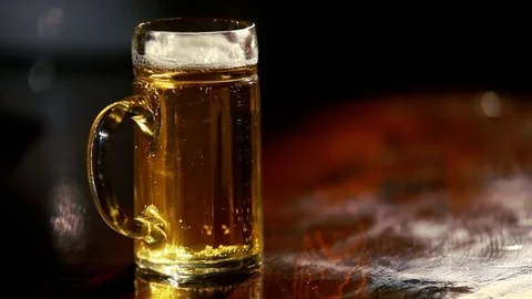 A glass of beer is on the bar. Stock Footage 80309241