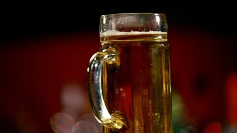 A glass of beer is on the bar. Stock Footage 80309243