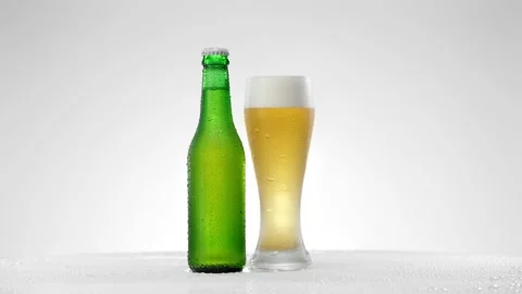 Glass of beer with a bottle of beer Stock Footage 152167701