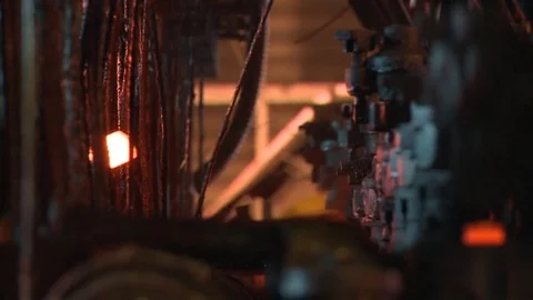 Glass beer bottles incandescent in production line slow motion Stock Footage