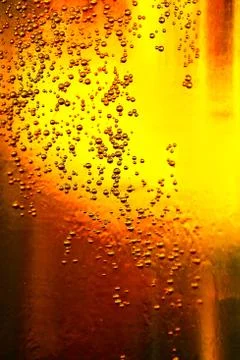 Glass of beer with bubbles Stock Photos