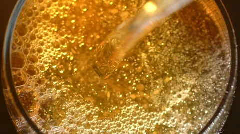 Glass of beer with bubbles top view Stock Footage 62478226
