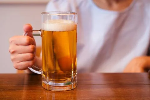A glass of beer in cafe Stock Photos