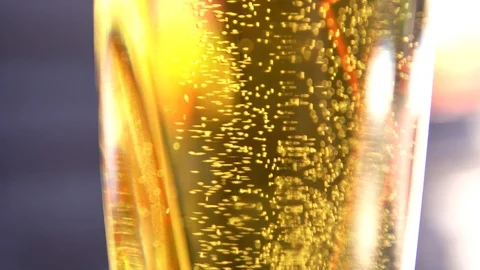 A glass of beer is close. Bubbles in beer. Stock Footage 92311693