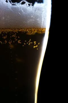 Glass with beer by closeup Stock Photos