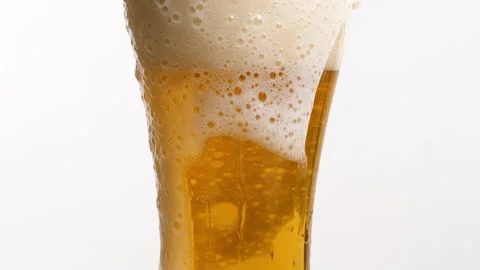 A Glass of Beer With a Foam Stock Footage 240809439