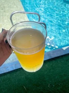 Glass of Beer by the Pool Stock Photos
