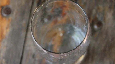 Glass of beer is pouring down Stock Footage 84138714