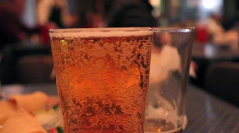 Glass of Beer in Restaurant Stock Footage 58997361