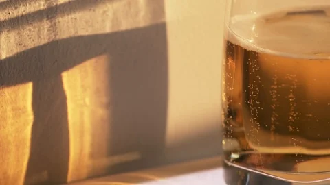 Glass of beer at sunset Stock Footage 111950554