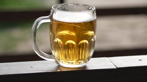 A glass of beer on the table panoramic Foto stock