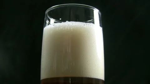 Glass with beer - tilt down Stock Footage 886503