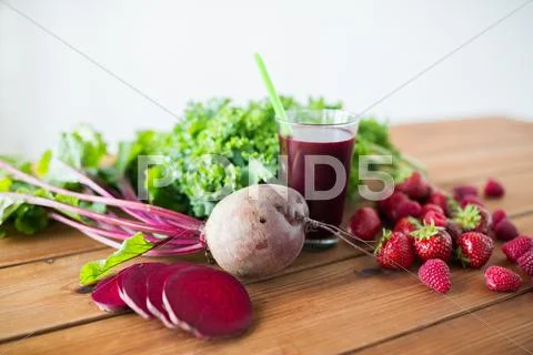 Glass of beetroot juice, fruits and vegetables Stock Photos