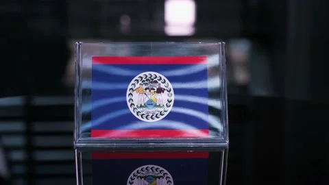 Glass Belize Flag Rotating On Table Stock-Footage 208476413