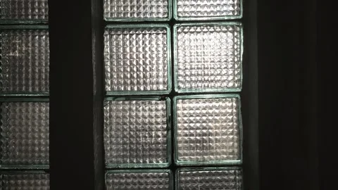 Glass blocks in a window frame with natural light shining through. Square p.. Stock Footage 306045977