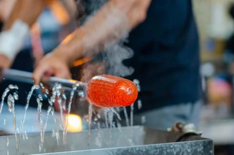 Glass blower manufacturing process Stock Photos