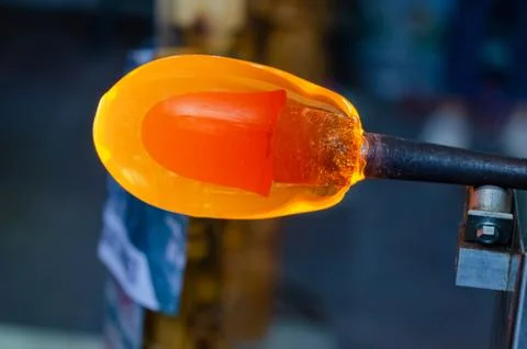 Glass blower manufacturing process Stock Photos