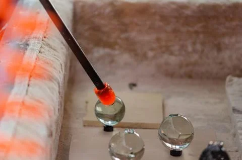 Glass blower manufacturing process Stock Photos