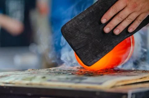 Glass blower manufacturing process Stock Photos
