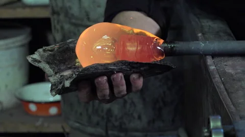 Glass-blower working in his workshop Video stock 58210998