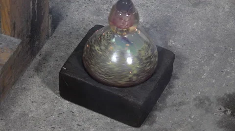 Glass-blower working in his workshop Video stock 58212863