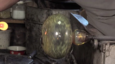 Glass-blower working in his workshop Video stock 58215119