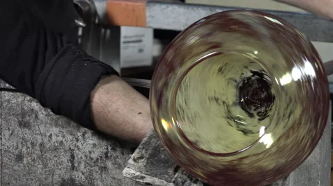 Glass-blower working in his workshop Video stock 58219024