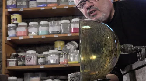 Glass-blower working in his workshop Stock Footage 58221816