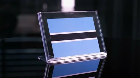 Glass Botswana Flag Rotating On Table 動画素材 208478630