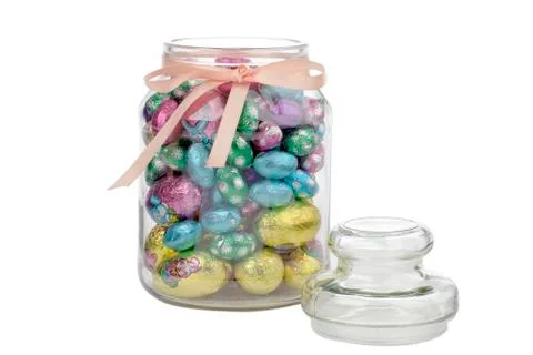 Glass bottle of an chocolate easter eggs Stock Photos