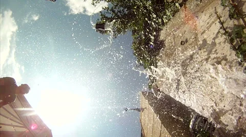 Glass Bottle Smash On Brick Wall Liquid Glass Fall On Camera Slow Motion Video stock 53336584
