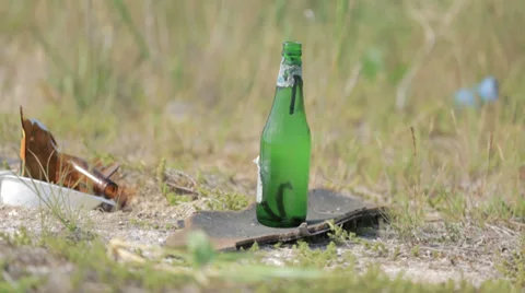Glass bottles getting shot Stock-Footage 36554213