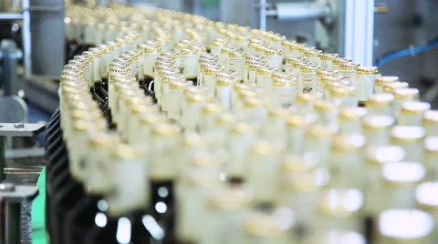 Glass bottles sealed with corks on the line Stock Footage 64695903