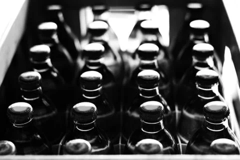 Glass bottles with soft drinks background in white tone Stockfoto's