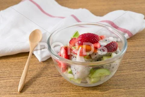 Glass Bowl Of Delicious Fruits Salad, Strawberries And Dragon Fruit With Cucu